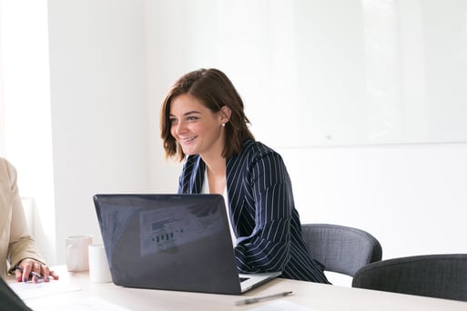 woman-smiling-with-laptop